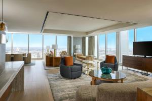 a living room with a view of a building at Marriott Marquis Houston in Houston