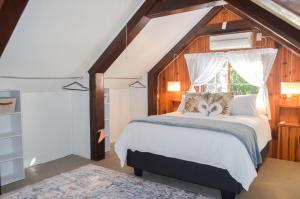 a bedroom with a bed and a window at The Meadow Manor in Port Edward +67 photos
