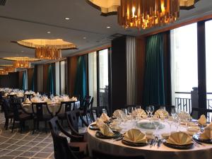 Restoran või mõni muu söögikoht majutusasutuses Legend Palace Hotel