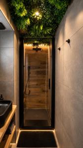 a bathroom with a shower and a sink at La Verriere & Le refuge in Foix +11 photos