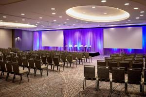 a conference room with purple curtains and chairs at San Francisco Marriott Union Square in San Francisco