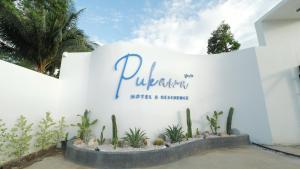 a sign for a hotel and a bunch of cactus at Pukawa Hotel & Residence in Chaloklum +46 photos