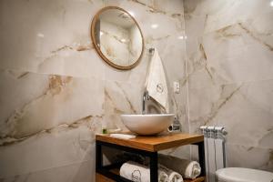a bathroom with a sink and a mirror at Madin Eco Hotel in Debed +52 photos