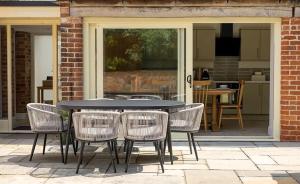 a black table and chairs on a patio at Bluebell in Edlington