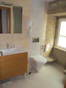 Phòng tắm tại Hotel Solar da Capela