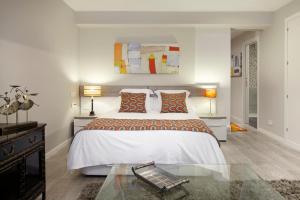 Posteľ alebo postele v izbe v ubytovaní Hika Mika Apartment by FeelFree Rentals
