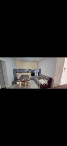 a living room with a couch and a table at Apartmani Seki in Bar