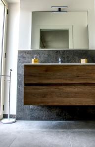 a bathroom with a sink and a mirror at Casa Alice in Numana