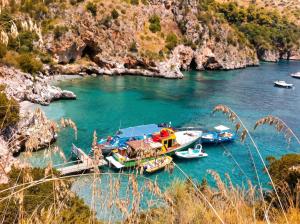 a group of boats are docked in a river at Charming Apartment in Velina, 90 m², Mountain View in Castelnuovo Cilento