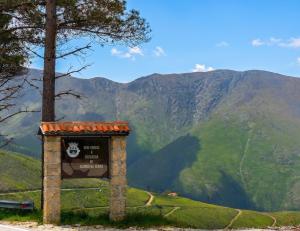 a sign on the side of a mountain at Charming Apartment in Alvoco da Serra with Mountain View in Alvoco da Serra