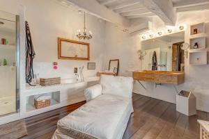 a living room with a couch and a sink at Antica Dimora in Capolona +25 photos