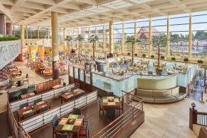an overhead view of a restaurant with tables and chairs at Sheraton Grande Tokyo Bay Hotel in Urayasu