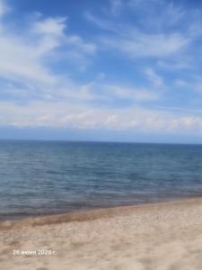 a view of the ocean from the beach at Maximus in Bokonbayevo +4 photos