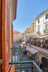 a view of a street from a balcony of a building at Maison Blu Royal in Amalfi