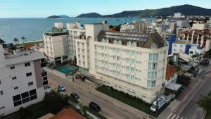 an aerial view of a building in a city at Varadero Palace Hotel in Florianópolis