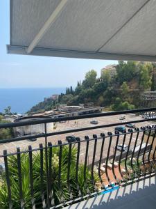 a balcony with a view of a highway at Fra Rooms in Taormina