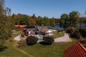 an aerial view of a house with a yard at Villa Waldsee in Vissefjärda