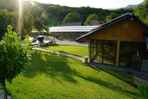 a view of the backyard of a house at Andrei's Refugium in Ocnele Mari +22 photos