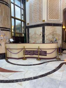 a large room with a stage in a building at فندق مرجانة الحجاز مكة المكرمة in Mecca