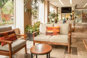 אזור ישיבה ב-Stanza Hotel