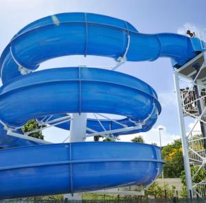 a blue water slide at a water park at Soleya Studio in Le Moule