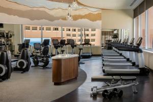 a gym with rows of treadmills and exercise equipment at The Westin Los Cabos Resort Villas in San José del Cabo