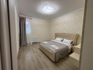 Llit o llits en una habitació de Sevan House 21 fotos més