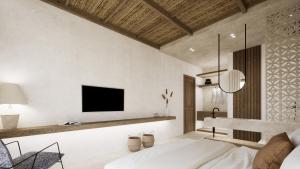 a living room with a tv on the wall at Malie Suites in Mikri Vigla +9 photos