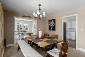 a dining room and kitchen with a table and chairs at Baskets, Brews & Views: Epic Wenatchee Escape! in Wenatchee