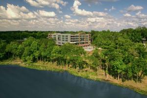 an aerial view of a building next to a river at Element by Marriott Bainbridge Riverfront in Bainbridge