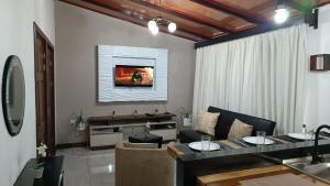 a living room with a couch and a table at Valys in Los Chiles