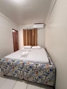 a bedroom with a large bed in a room at Hospedaria Maranhense in São Luís +22 photos