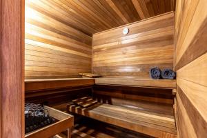 a sauna with wooden walls and a wooden ceiling at Mountain Forest Manor in Hiawassee