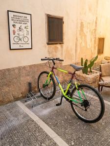 a bicycle is parked next to a building at INTERNO 13 Apartament in Spinazzola