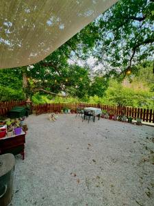 a dog laying in the middle of a patio at RVilla in Pavliani