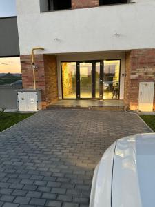 a car parked in front of a building at Day Studio in Focşani