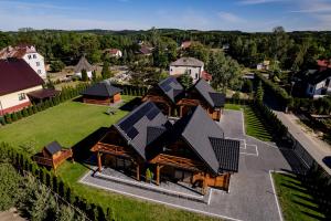 an aerial view of a house in a village at Domki przy Alei in Krasnobród