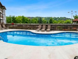 a large swimming pool at a hotel at Turkey Nest by Beyond Expectations Renovated 2BR in Gatlinburg