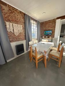 a dining room with a table and chairs at Apartamento El Rancho in San Pedro