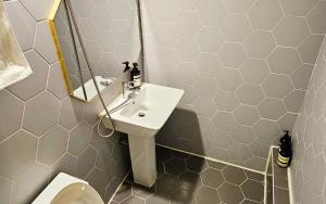 a bathroom with a sink and a toilet at Hotel AMY in Incheon +52 photos
