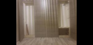 a shower with a glass door in a bathroom at O&M Port Piraeus in Piraeus
