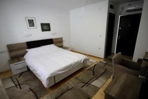 Voodi või voodid majutusasutuse Konak Nestor Bungalows toas