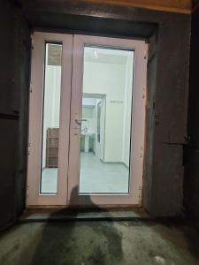 a door in a room with a mirror in it at MG guest house in Geghanist