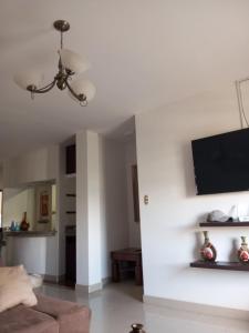 Televisi dan/atau pusat hiburan di Hostal Oasis