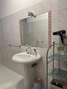 a bathroom with a sink and a mirror at B&B La Tenuta in Fermo +29 photos
