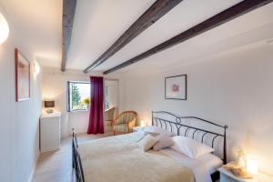 a bedroom with a bed and a window at Hedera Estate, Villa Hedera VIII in Orasac +49 photos