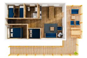 a floor plan of a house with blue at Waterlodge 8 persons #WL05 in Maasbree