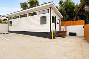 a tiny house is parked in a parking lot at Spacious 1BR 1bath near DTLA in Los Angeles
