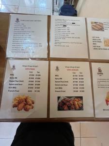 a picture of a menu for a restaurant at Serenity Escape, Cozy Stay w Secure Parking in Runaway Bay