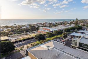 an aerial view of a city and the ocean at Seaside Studio Apartment in Frankston, Melbourne in Frankston